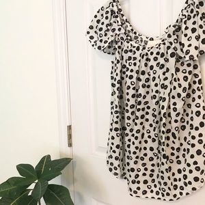 Feminine polka dot Maeve blouse from Anthropologie
